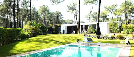 Pool with sunbathing area