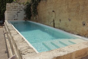 New swimming pool converted from ancient stone water tank