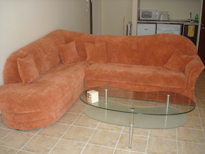 The living room sofa folds down into a very comfortable double bed