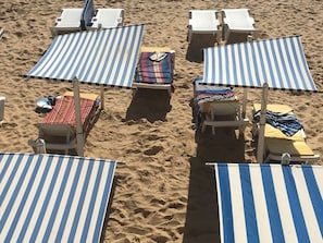 Sun-beds and shades can be rented on the beach