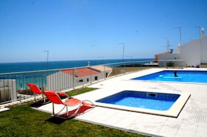 Pool area. Large adult pool + smaller children pool