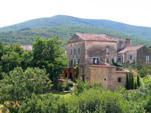 The house and the surrounding hills