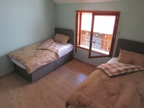 beautifully decorated twin room benefitting from new beds