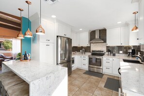 Kitchen - dishwasher, induction cook top, ice maker, microwave