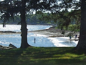 Enjoy the beach just steps from the lawn