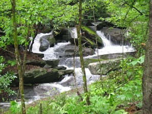 Upper waterfall and Laughing Waters Creekside Cottage