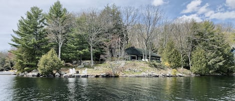 Charming Muskoka family cottage on its private point on Lake Joseph.