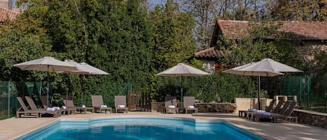 South facing pool ( 6m x 14m. Deep 1.20m to 2.20m). Long chairs, parasols