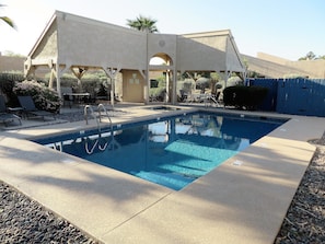 Newly renovated community pool with heated spa.