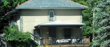 The Stable House, with outside entrance to 2nd floor studio with skylight.