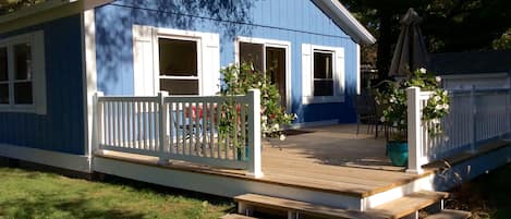 Brand new deck, railing, exterior paint and trim and windows! 