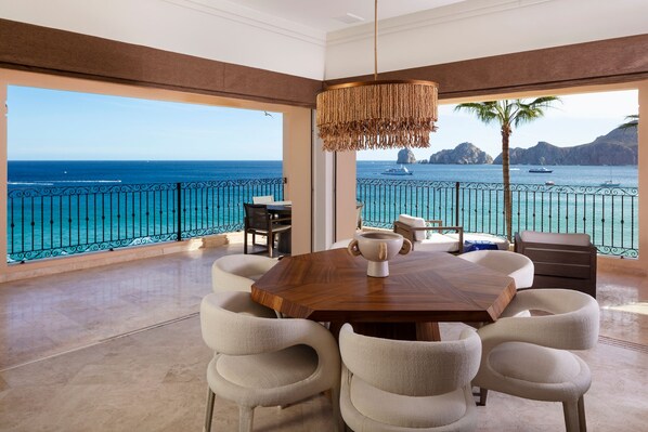 Contemporary inside/outside dining area on terrace