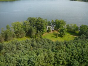 Aerial view.  Plenty of privacy and outdoor space in addition to the lake front