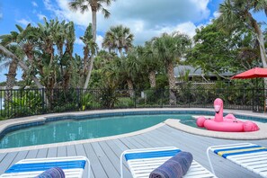 From the 4th bedroom walk out onto the pool deck and soak up some morning sunshine with your first cup in hand.