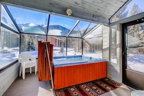 Enjoy a soak & beautiful view from the private hot tub / sun room