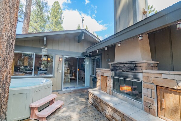 Outdoor fireplace and hot tub