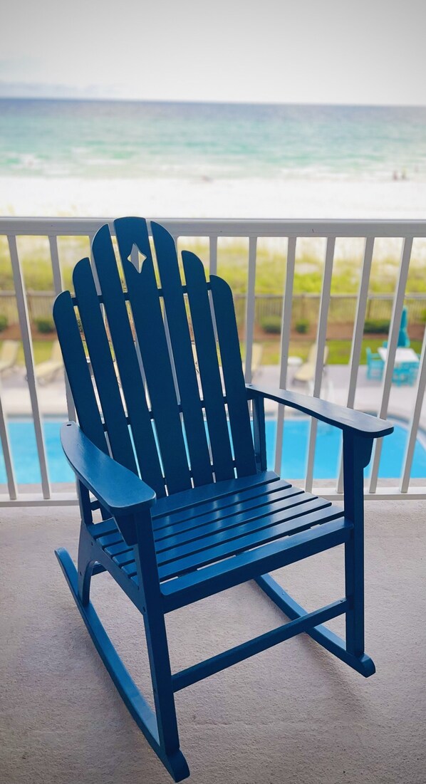 Gaze into the gulf in our old blue chair 