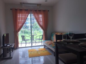 Living room with a balcony view