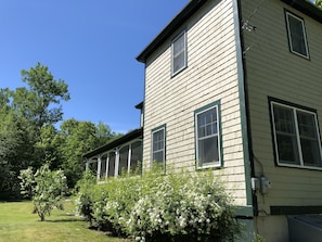 The back corner of the house, looking to the front yard.