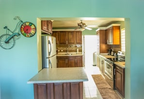 Cook up a storm in the fully equipped kitchen. Why not try some Jamaican dishes?