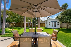 Enjoy outdoor meals and great conversation in our private backyard.