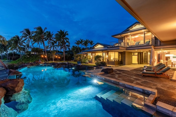 Outdoor living at its finest with a poolside retreat under the stars.