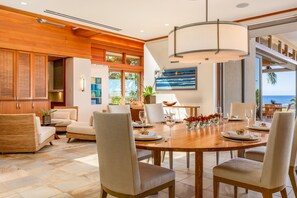 Dinner feels extra special with warm lighting, a table fir six in a beautiful setting.