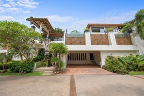 The villa offers a large parking space perfect for a lot of guests.