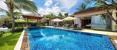 This villa features a 12m infinity pool with outdoor lounge area.