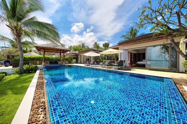 This villa features a 12m infinity pool with outdoor lounge area.