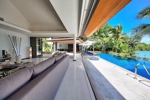 Indoor living area with sofa and air conditioning