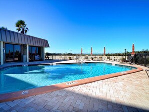 Come lounge by the beachside pool.