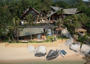 There is a private beach to explore, as well as villa's own kayak & paddle board