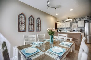 Open kitchen and dining area.  Dining table for 6.