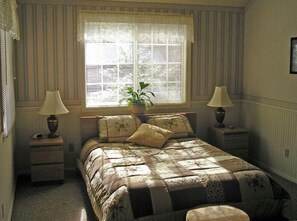 Large bedroom, tempurpedic bed.