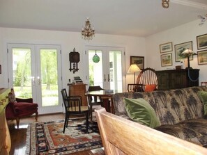 Another view of living room, table for games or laptops