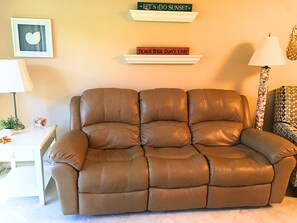 Leather sofa in family room with electric reclining seats