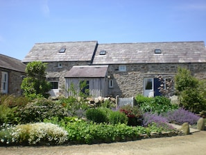 The rear of both of the cottages at Porthiddy Farm West - Ty Canol & Bwthyn Hir