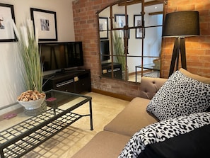 Cosy living room with underfloor heating and smart TV