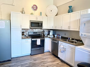 New full size appliances, fully stocked kitchen items. Washer/Dryer