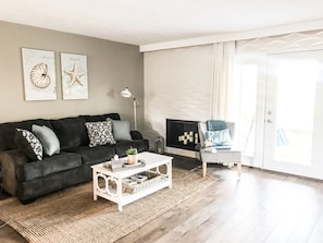 Bright and airy living room with modern coastal decor.  