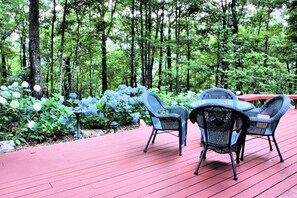 Large, landscaped deck for enjoying the beautiful woodland setting.