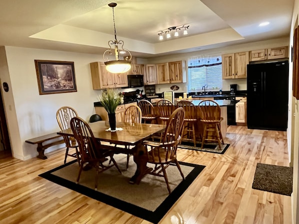 Large open concept dining room & kitchen with island/breakfast bar