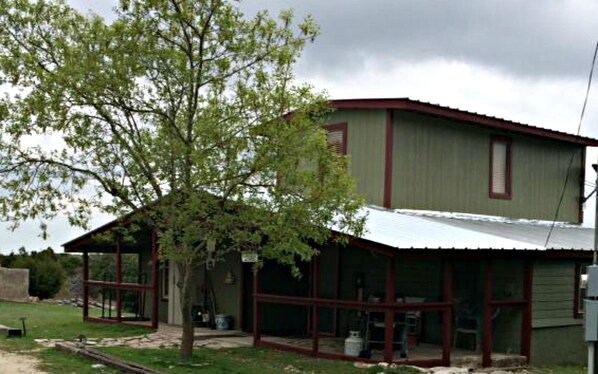 Front of guesthouse. Front and back porch