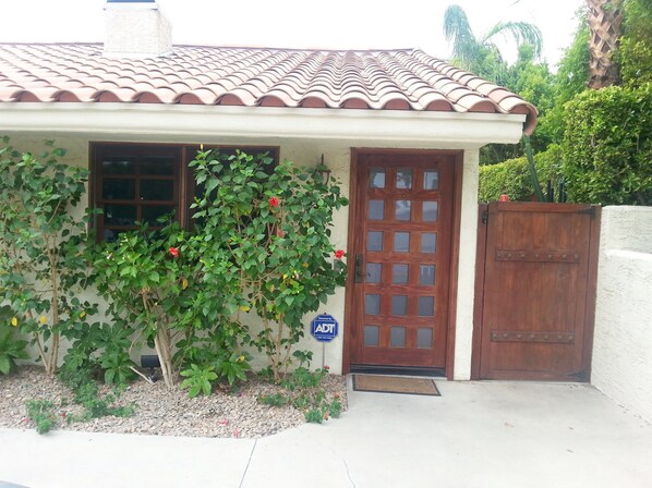 Beautiful desertscape in front and in our side yard.