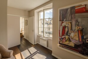 Entry hall with toilets. Access to open space of 970sqf