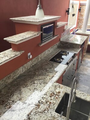 Granite countertops in outdoo kitchen area