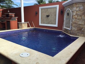 Pool area is completely private with fountain.