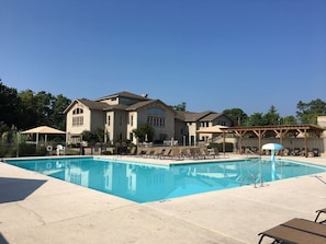 Pergola provides shade for pool area