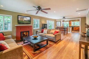 Brand new wood flooring in living room, dining room, and kitchen!